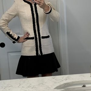 Authentic class Chanel jacket. Beautiful cream with black. Size 36, model size 2